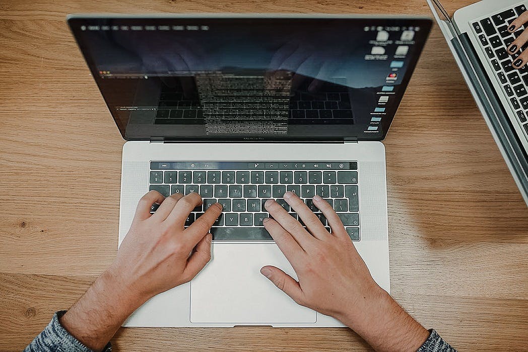 featured image - Why Programmers Love Macbooks?