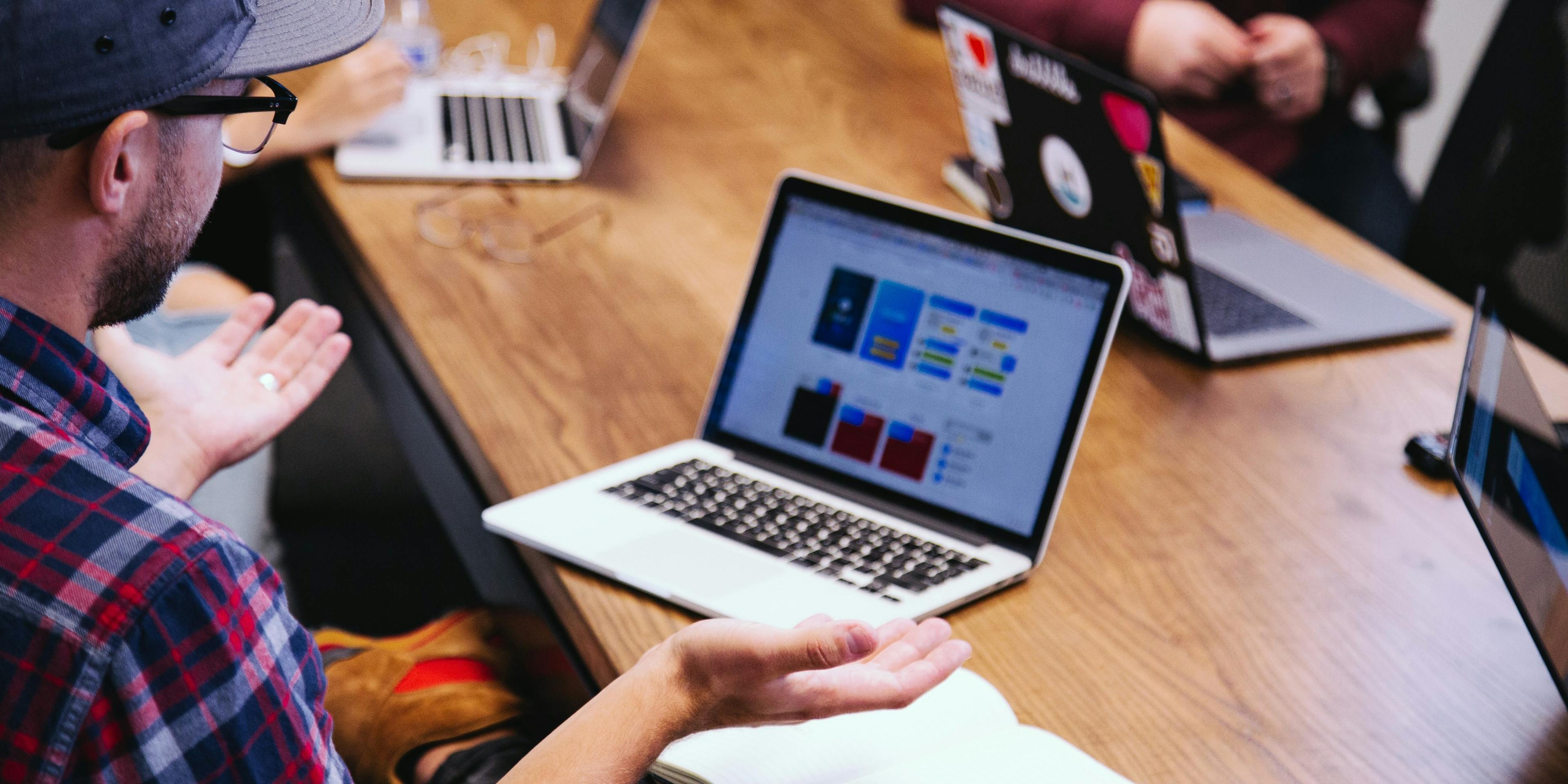 /outsourcing-vs-in-house-development-a27a1c910d1c feature image