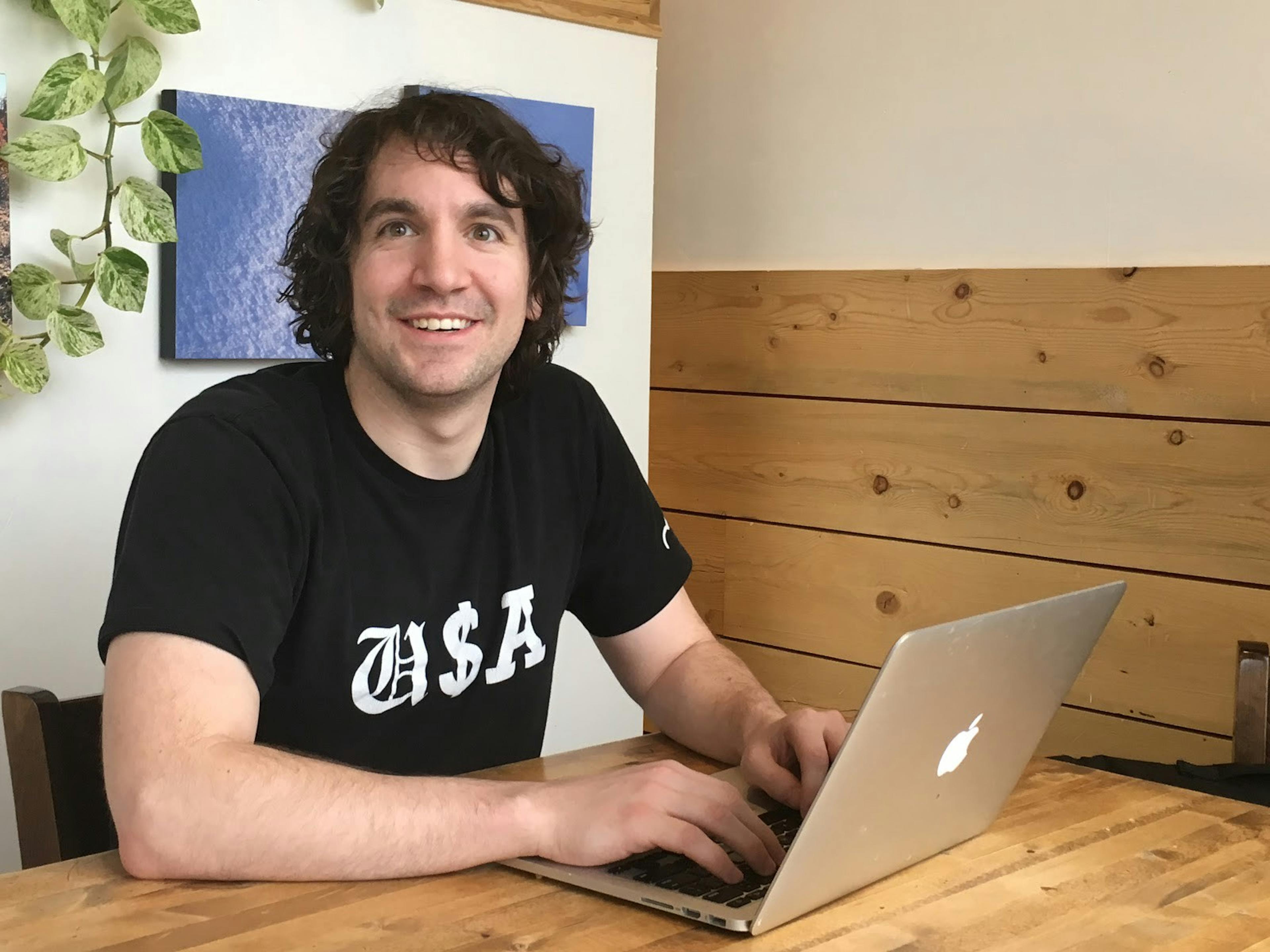 David Smooke startup life in a Colorado coffee shop. Hair longer.