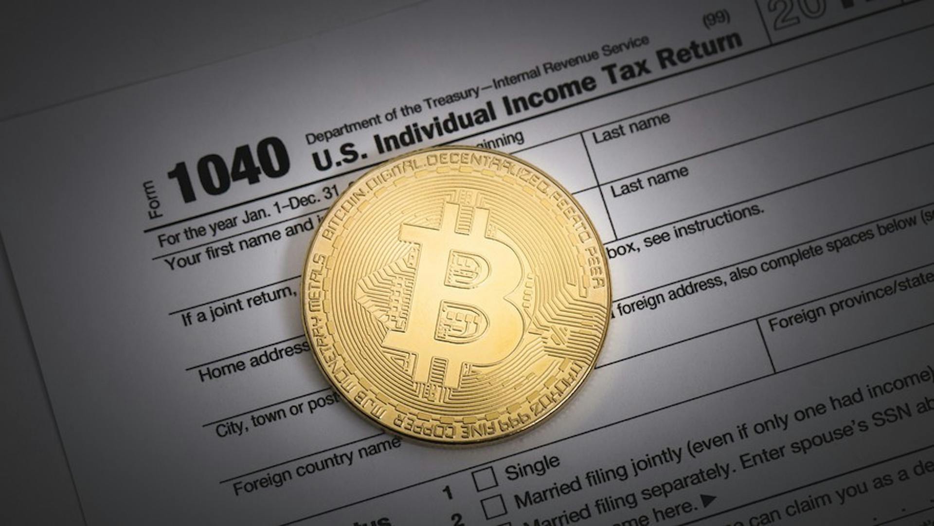 featured image - Paying Taxes On Bitcoin — Everything You Need to Know