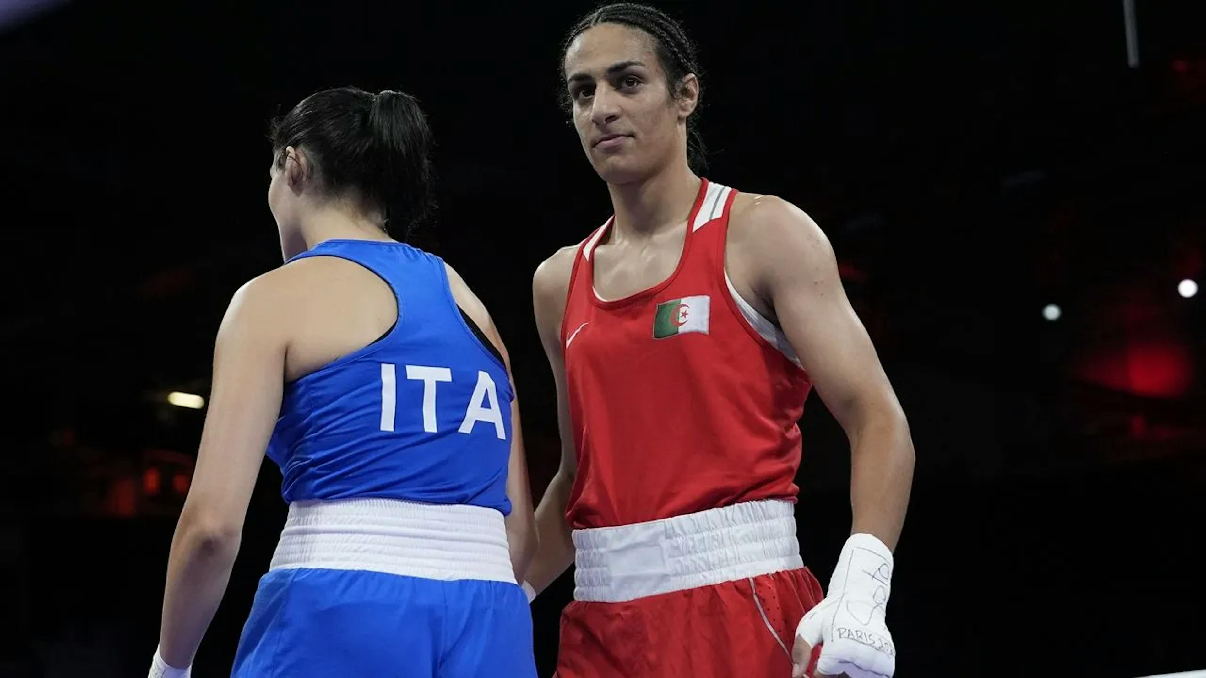 Olympic boxer Imane Khelif (red)