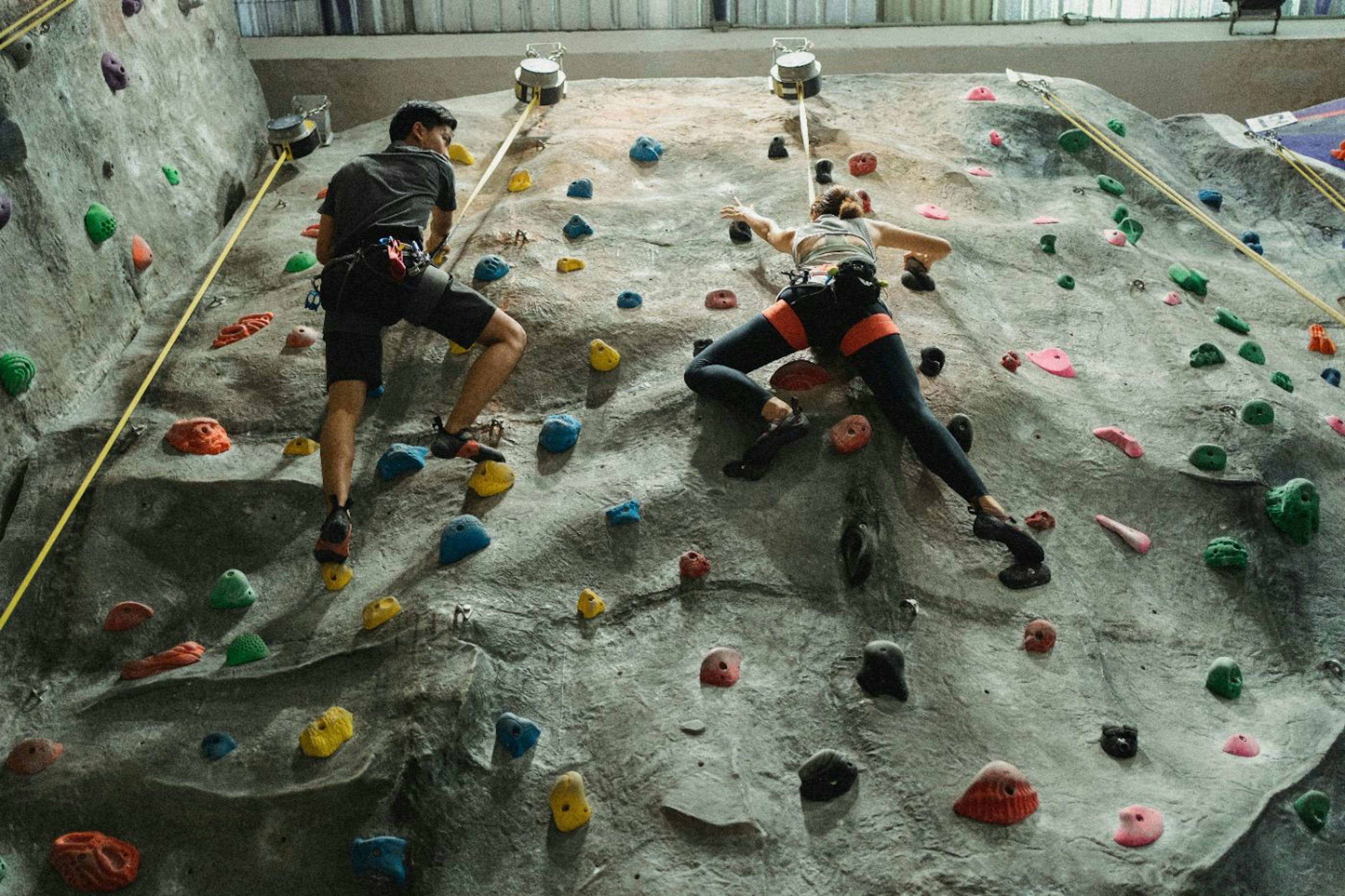 People climbing the climbing wall - physical state of agile.