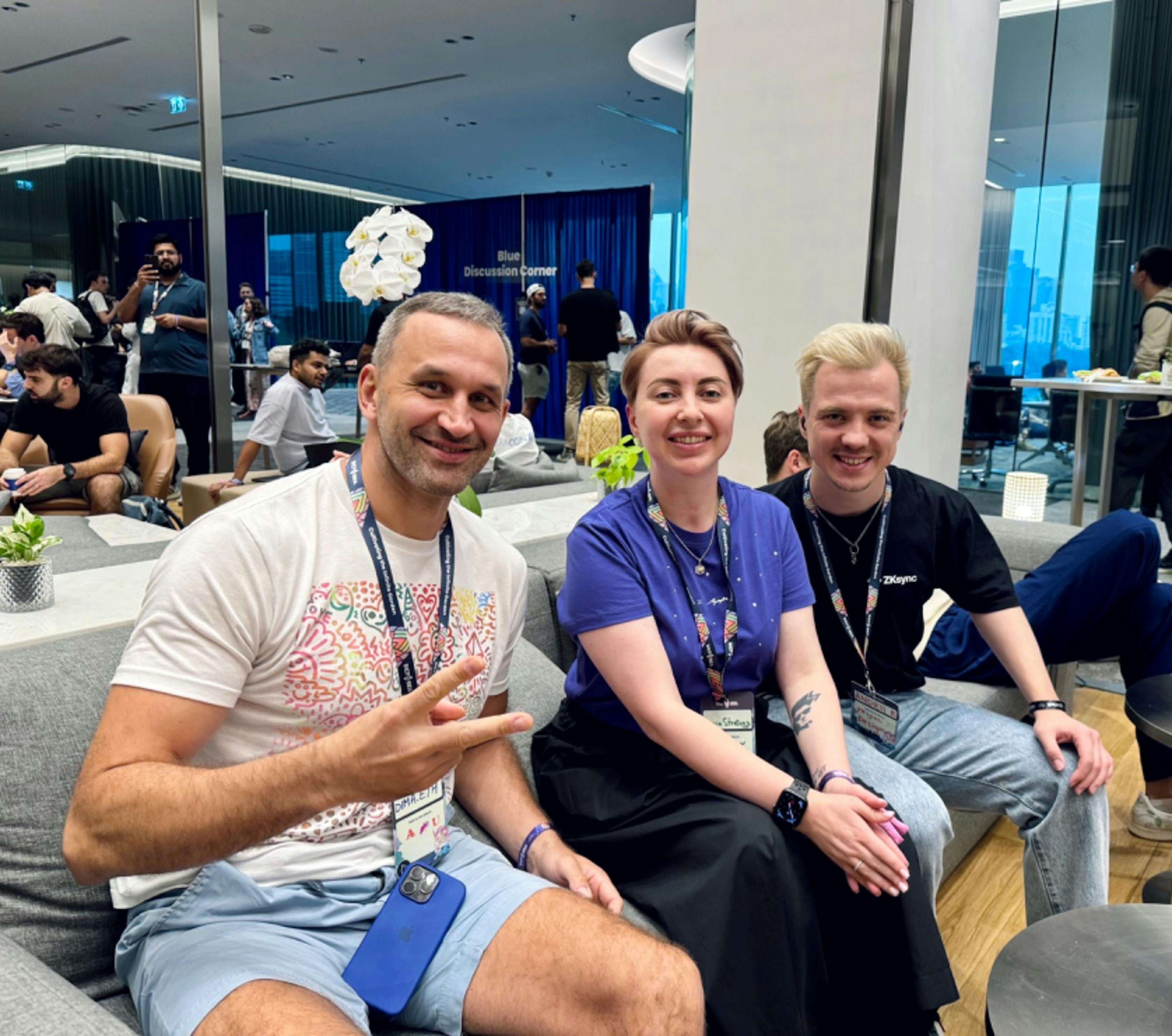 My husband Andrii and I with Dima Buterin, Vitalik's father