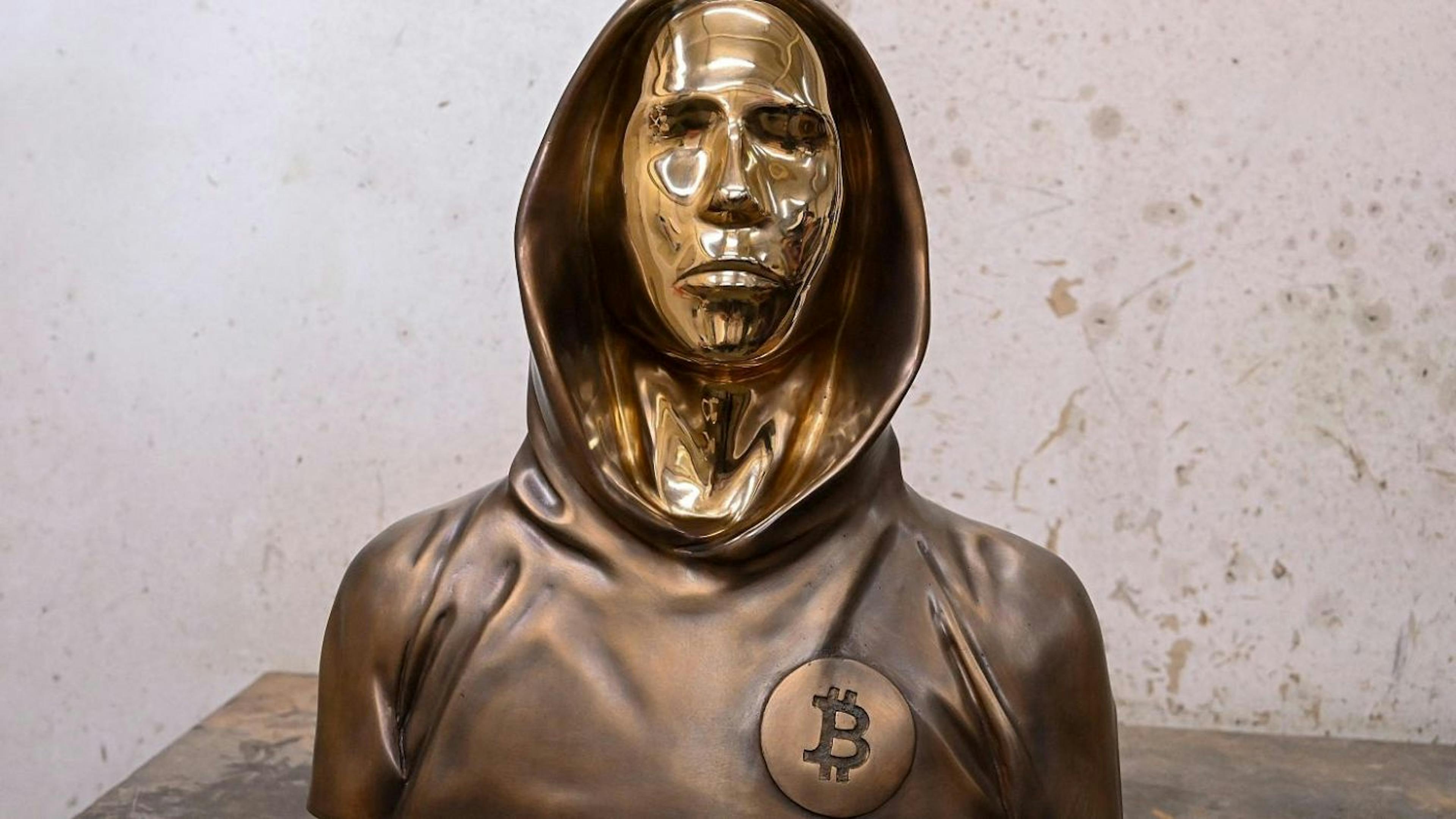 Statue of Satoshi Nakamoto, the mysterious inventor of Bitcoin (Copyright ATTILA KISBENEDEK/AFP)