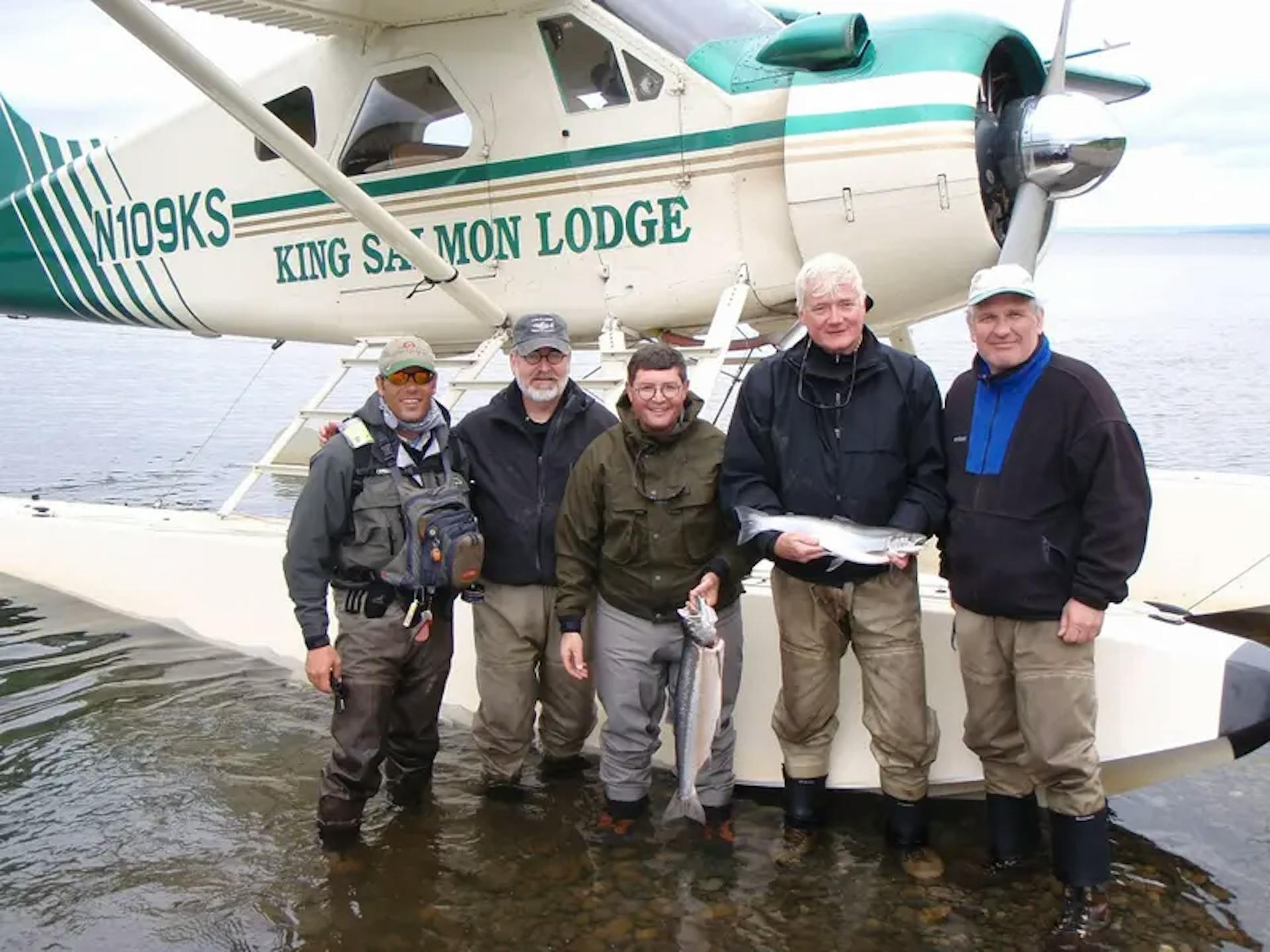 Leonard Leo, center, on the 2008 fishing trip with a guide and other guests. Leo attended and helped organize the Alaska fishing vacation. Credit: Photo obtained by ProPublica