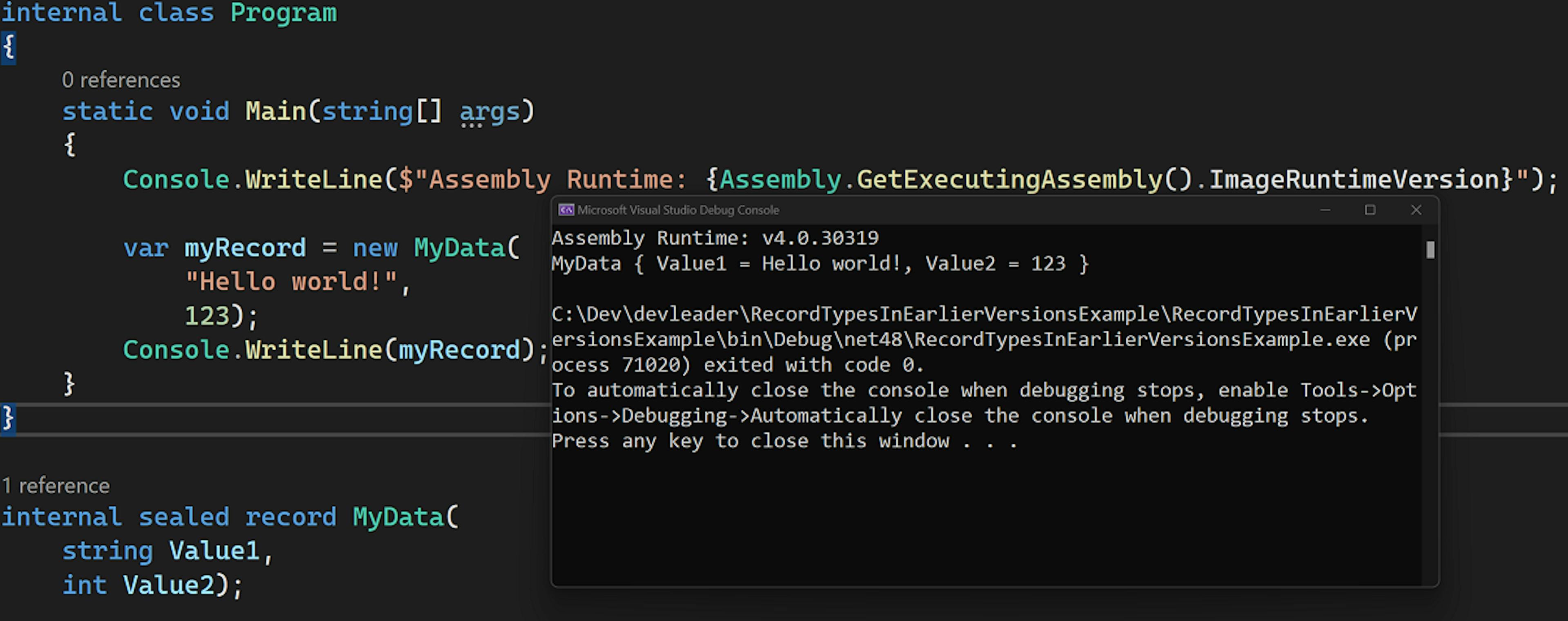 The console window shows the assembly runtime as well as the output of the record ToString() method.