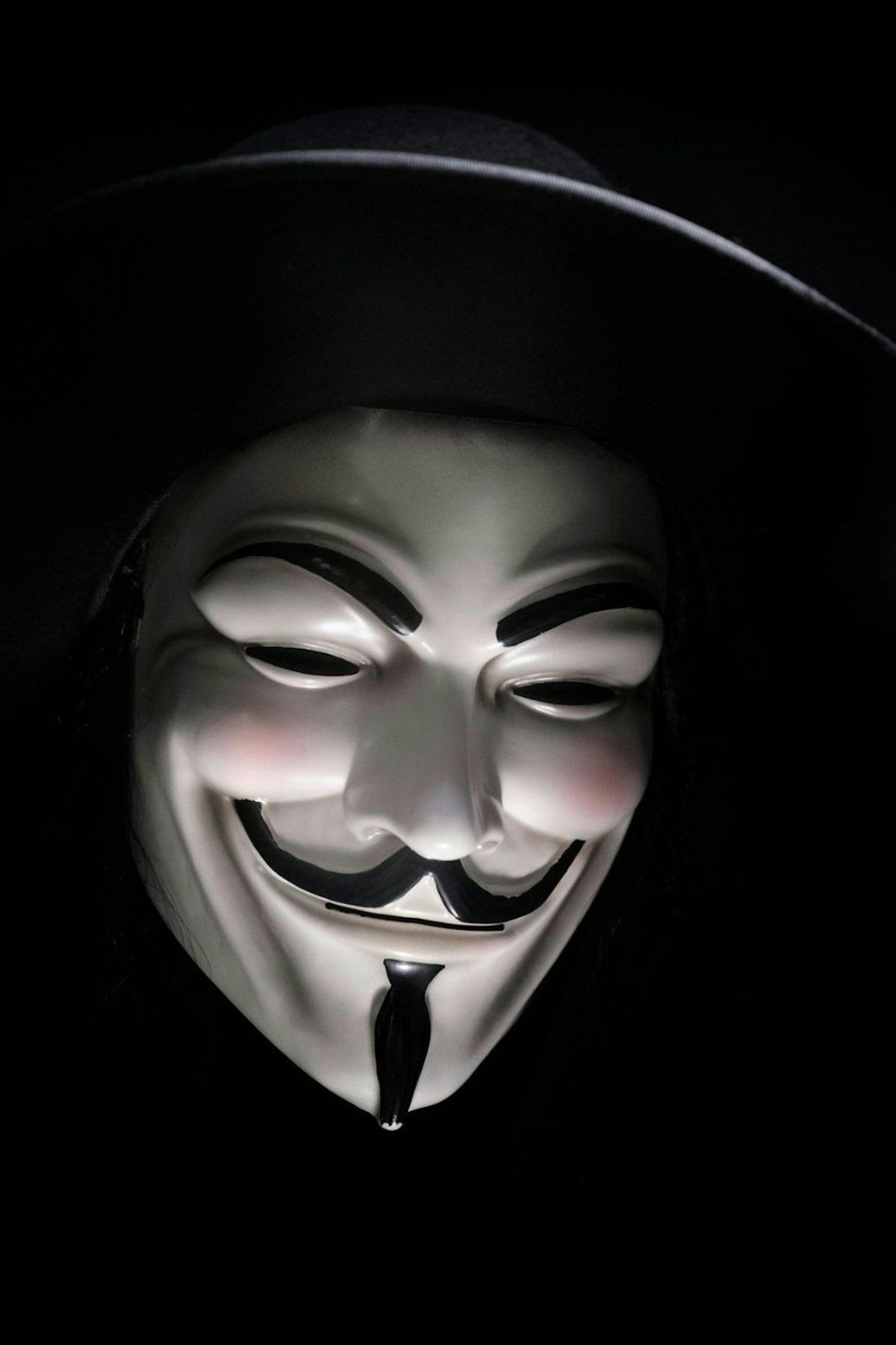 a hacker wearing a mask 