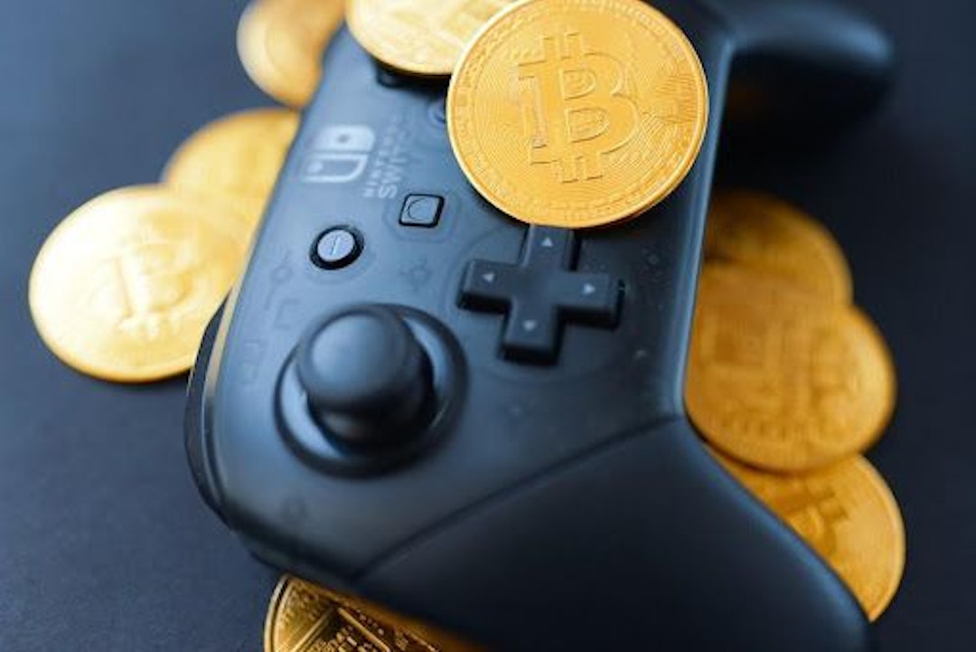 featured image - A Different Way to Invest in Crypto: Your Guide to P2E Gaming