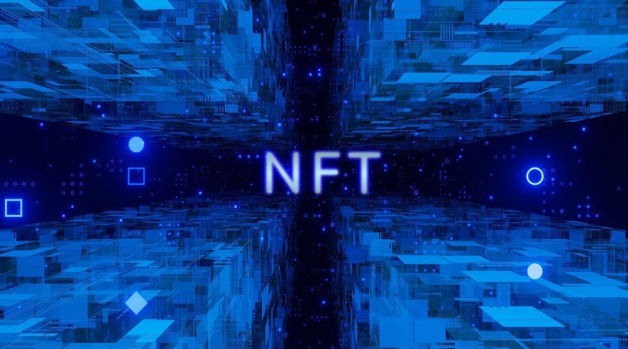 featured image - NFT Gaming is The Key to Wider Token Adoption in 2022