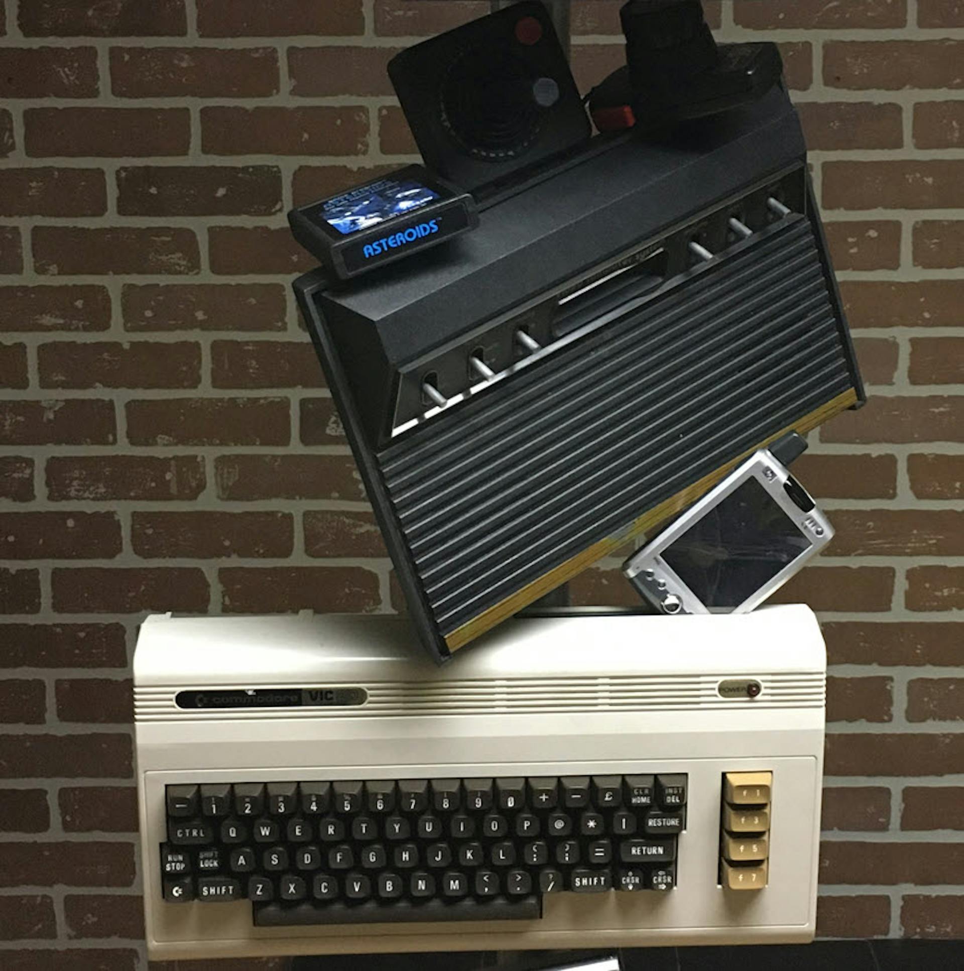 My original Atari 2600 with Asteroids game cartridge and Vic 20 (and an original HP iPAQ smartphone)