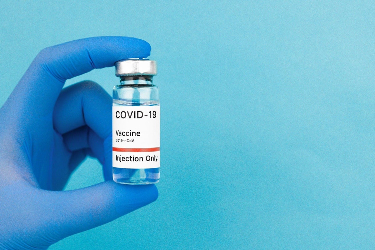 featured image - COVID Vaccine Rash: Managing The Side Effects of the COVID-19 Vaccine
