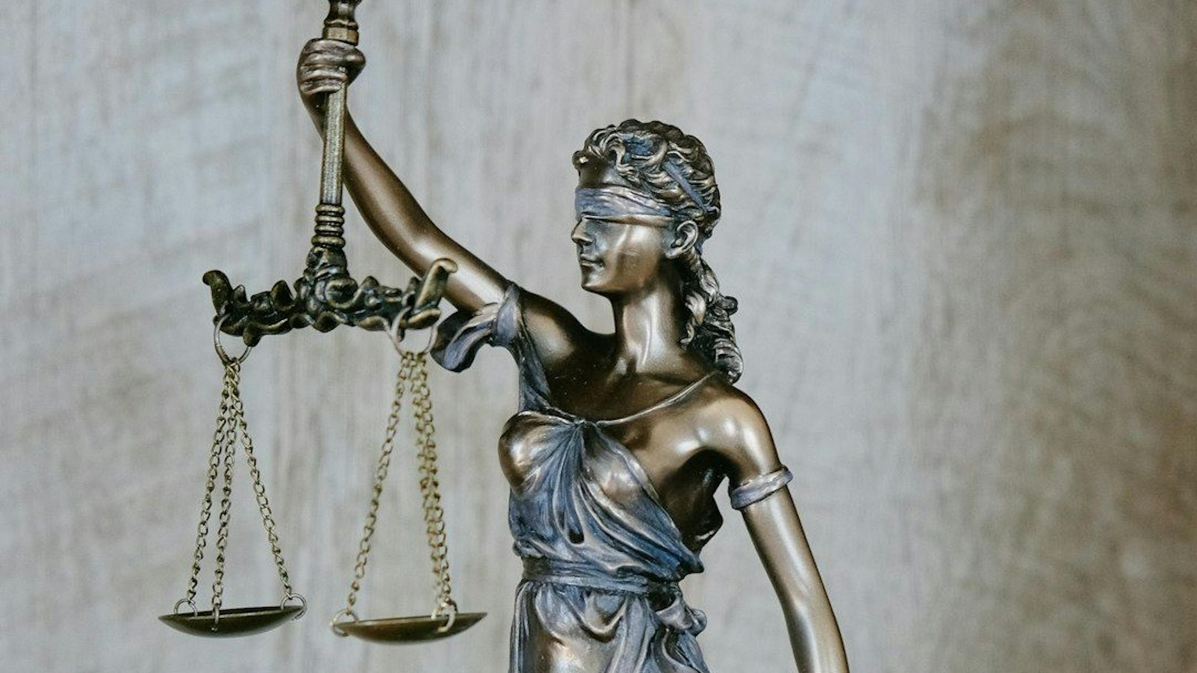 featured image - Courts Are Drowning in Cases. Can AI Save the Day Without Becoming a Liability?