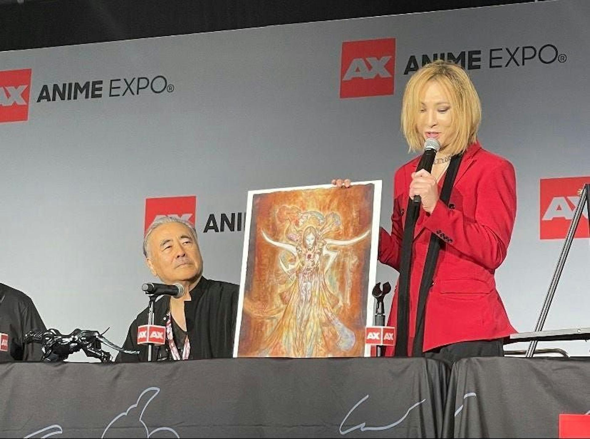 Yoshitaka Amano on the left. Yoshiki on the Right.