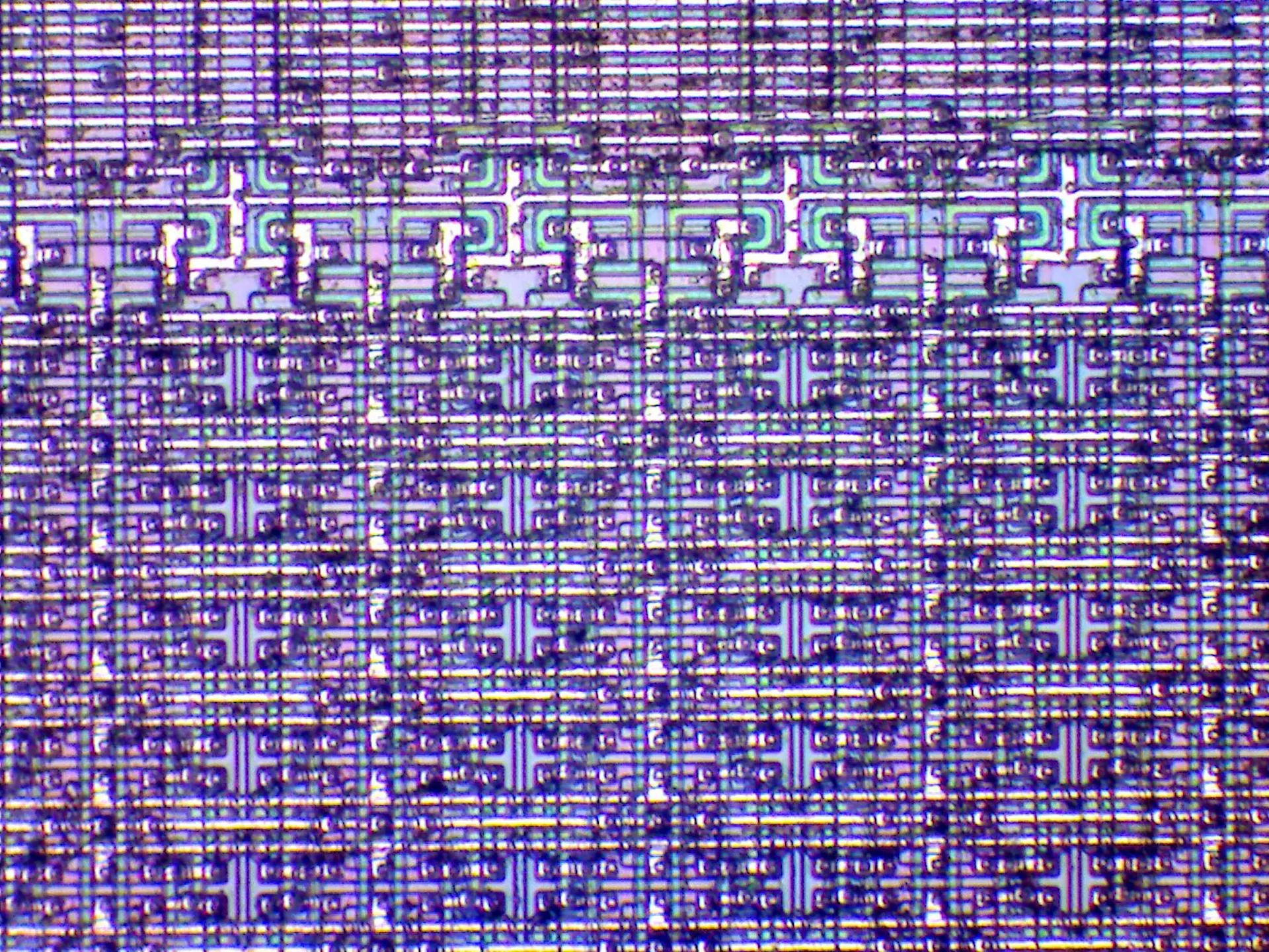Macro die shot of a microprocessor's register file. Photo: Piotr433 / Wikimedia Commons (CC0).