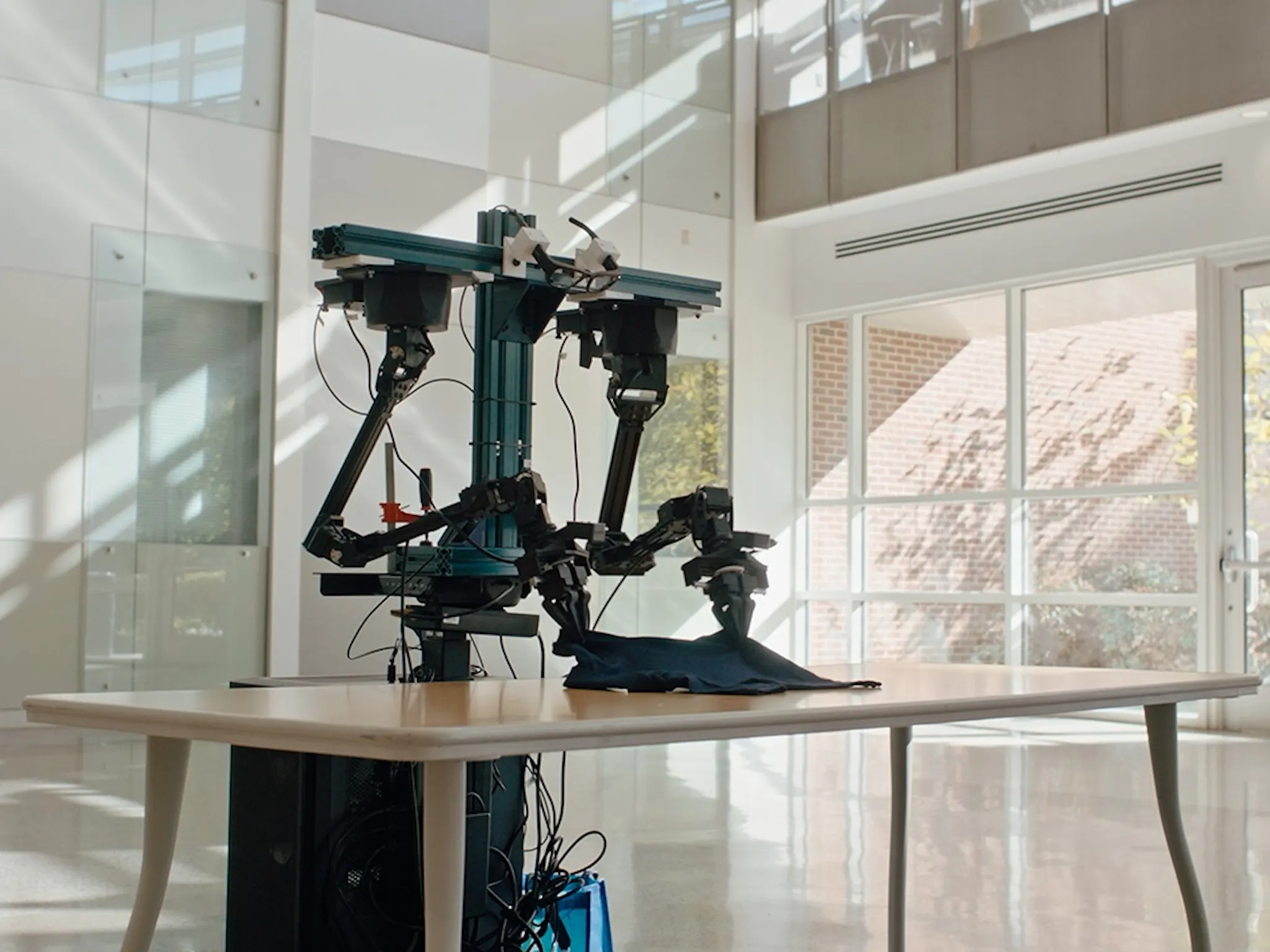 A bimanual research robot of the kind Meta's V-JEPA world model controls