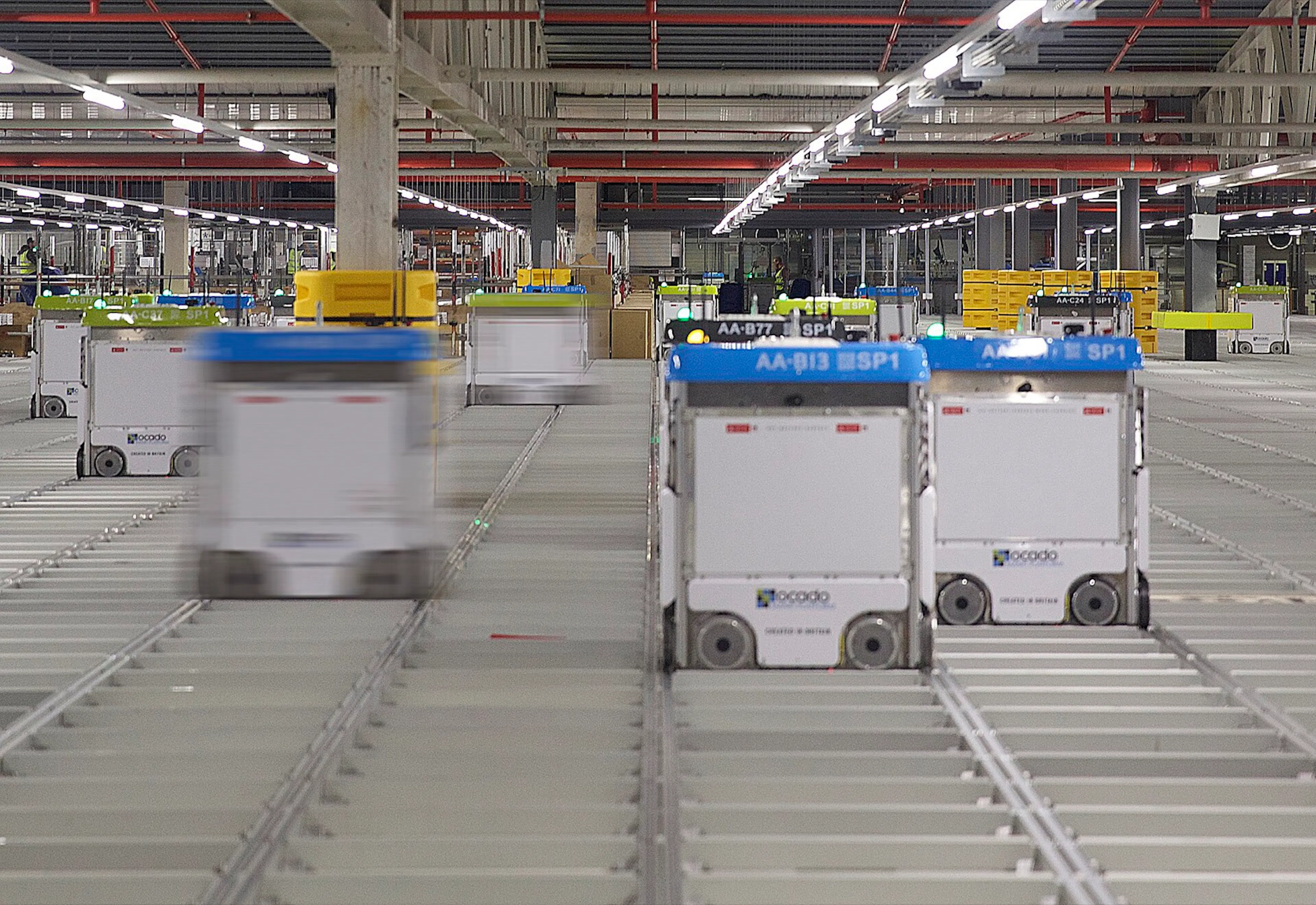 Autonomous grid robots in a highly structured warehouse. This is what winning looks like when form is allowed to follow function.