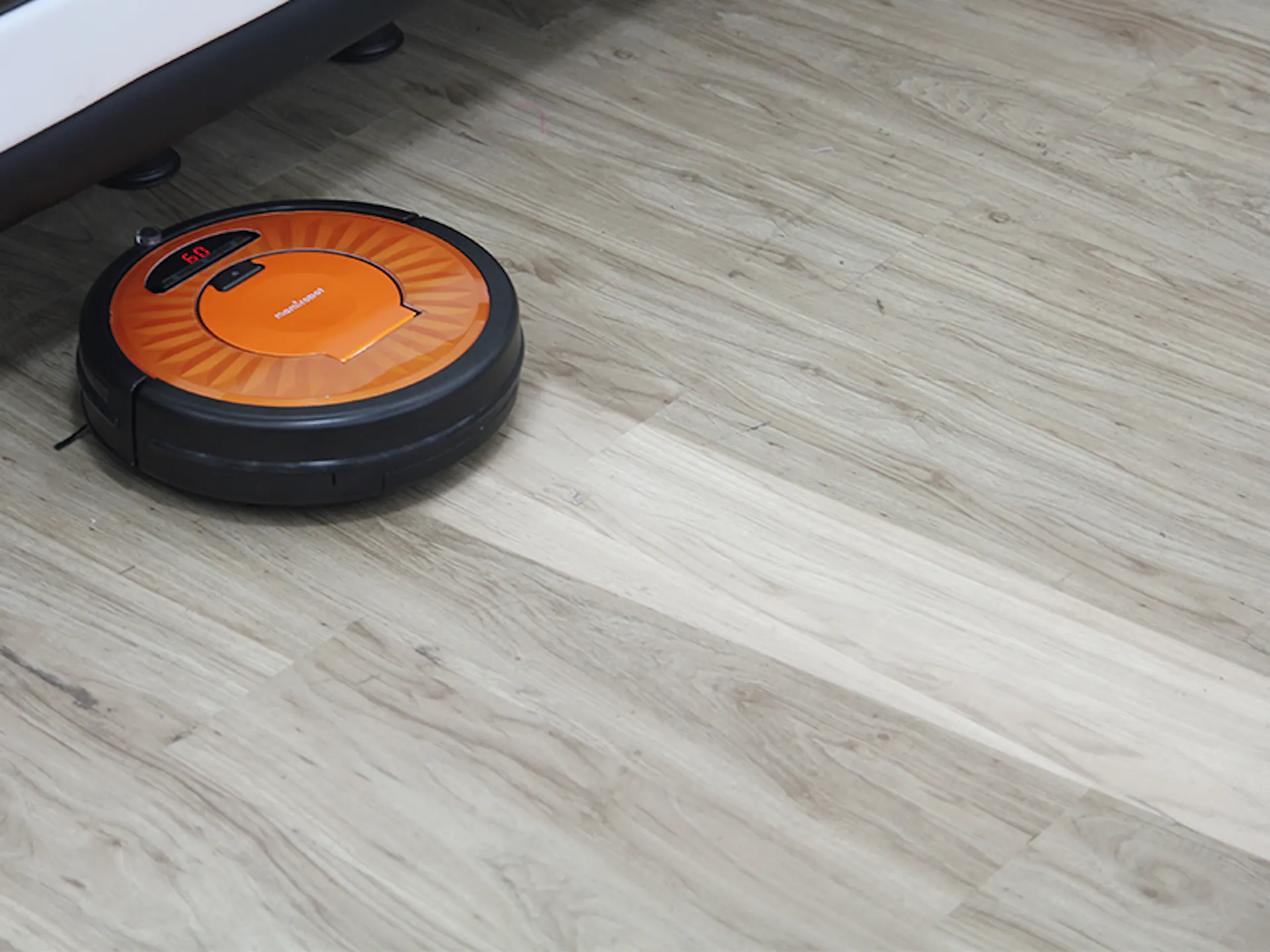 A robotic vacuum at work. No arms, no legs, no face — and the best-selling autonomous machine ever built.