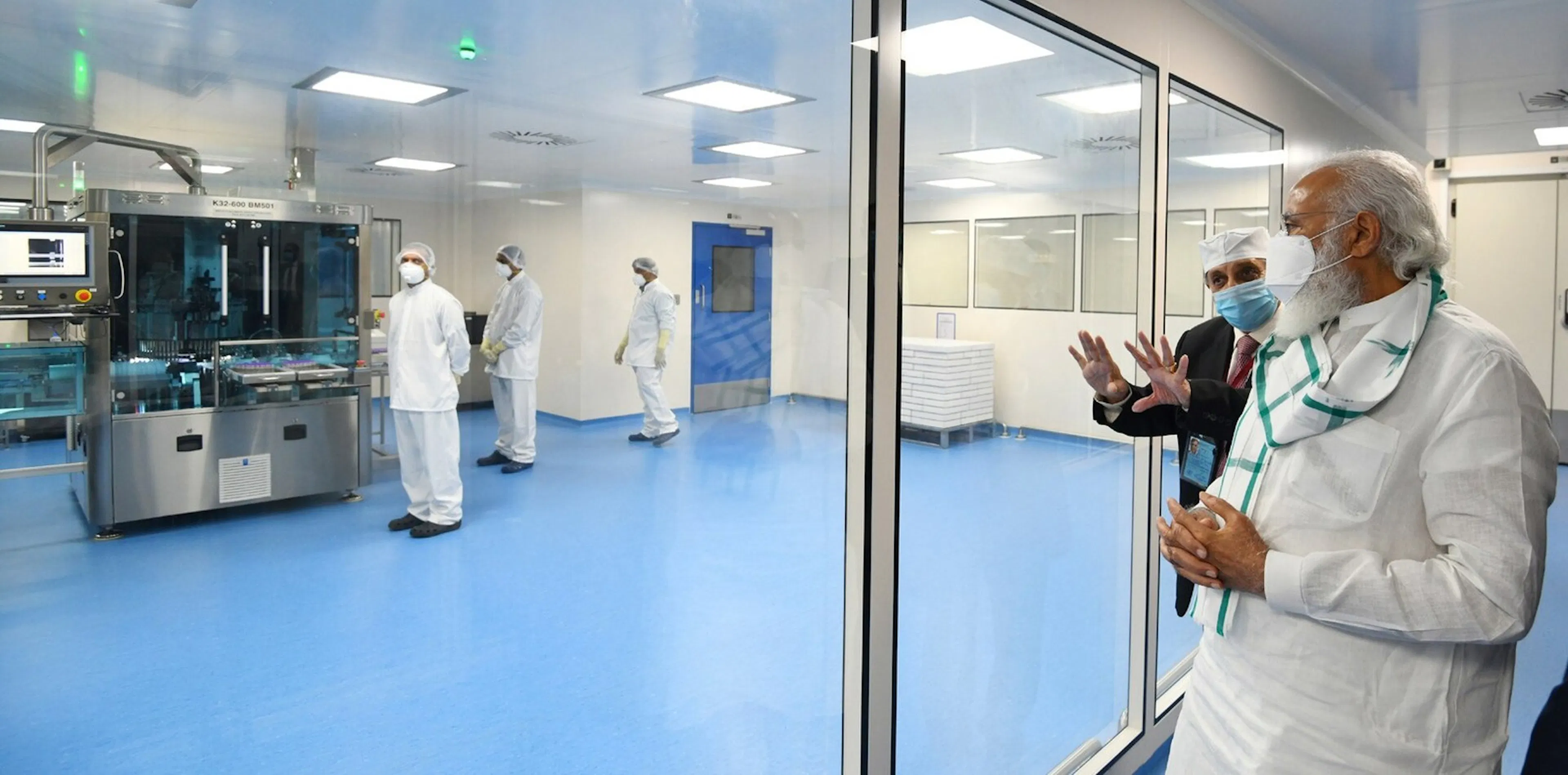 A vaccine filling line inside a cleanroom at the Serum Institute of India in Pune