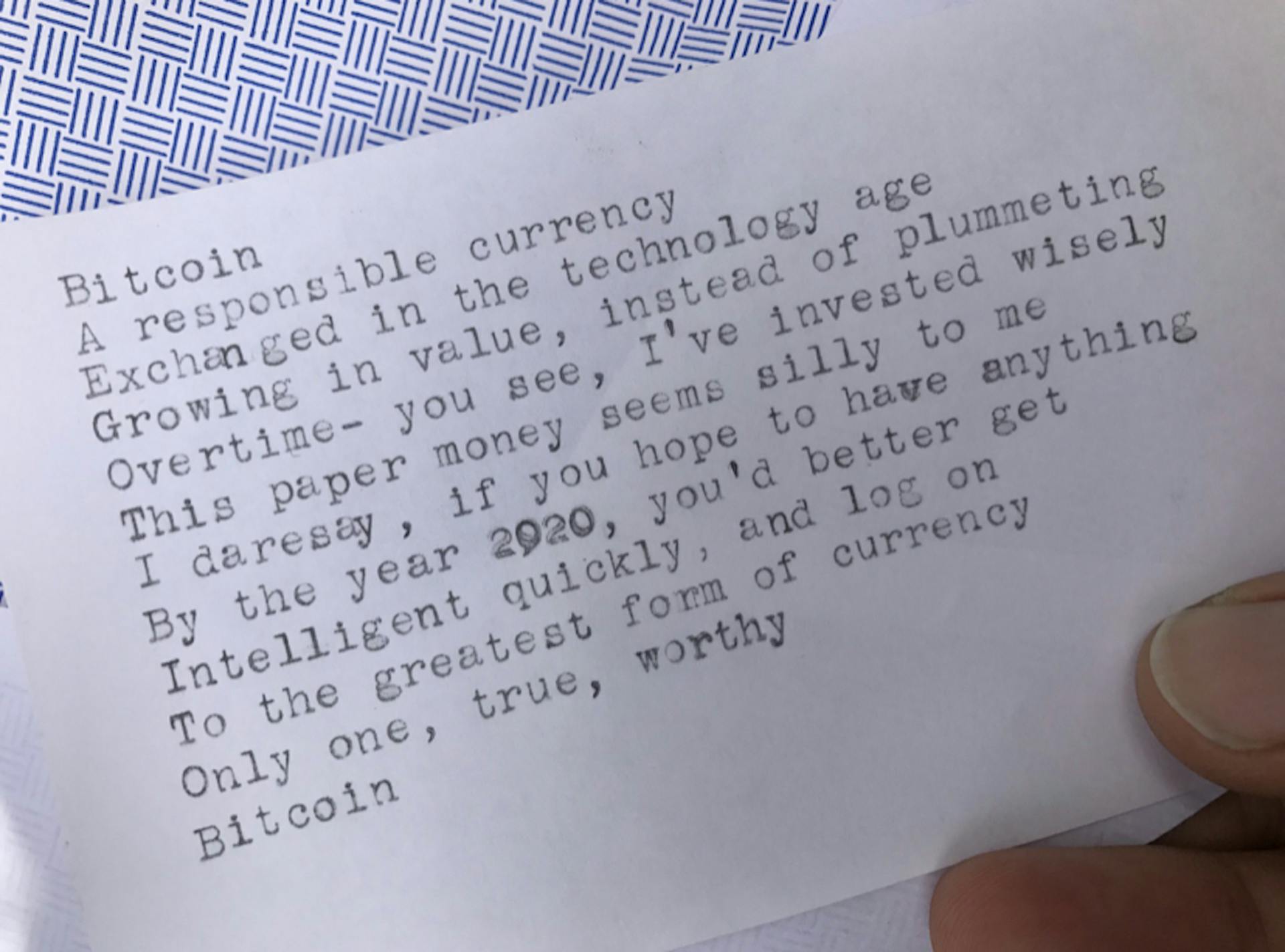According to @MadBitcoins on Twitter he gave the topic Bitcoin to a poet and received this typewriter one as pictured back in 2017