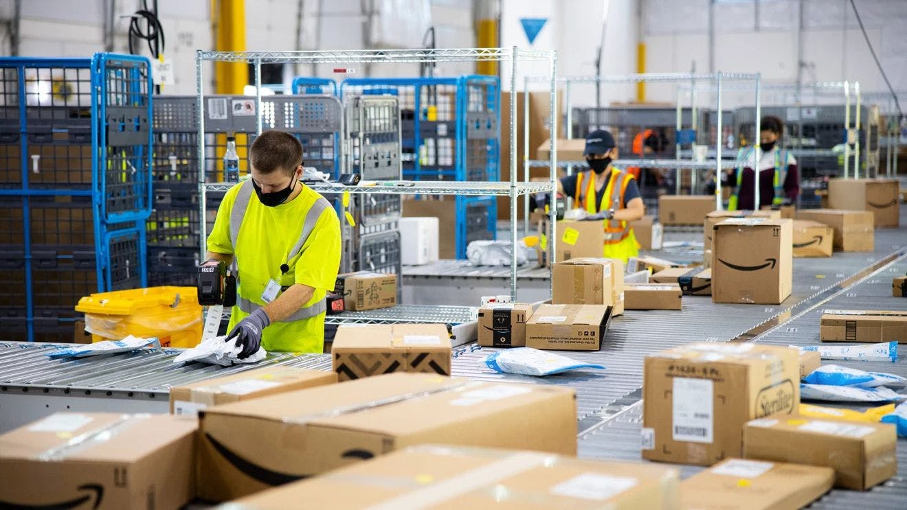 featured image - The Human Cost of Amazon Sparrow: How Automation is Impacting Warehouse Workers