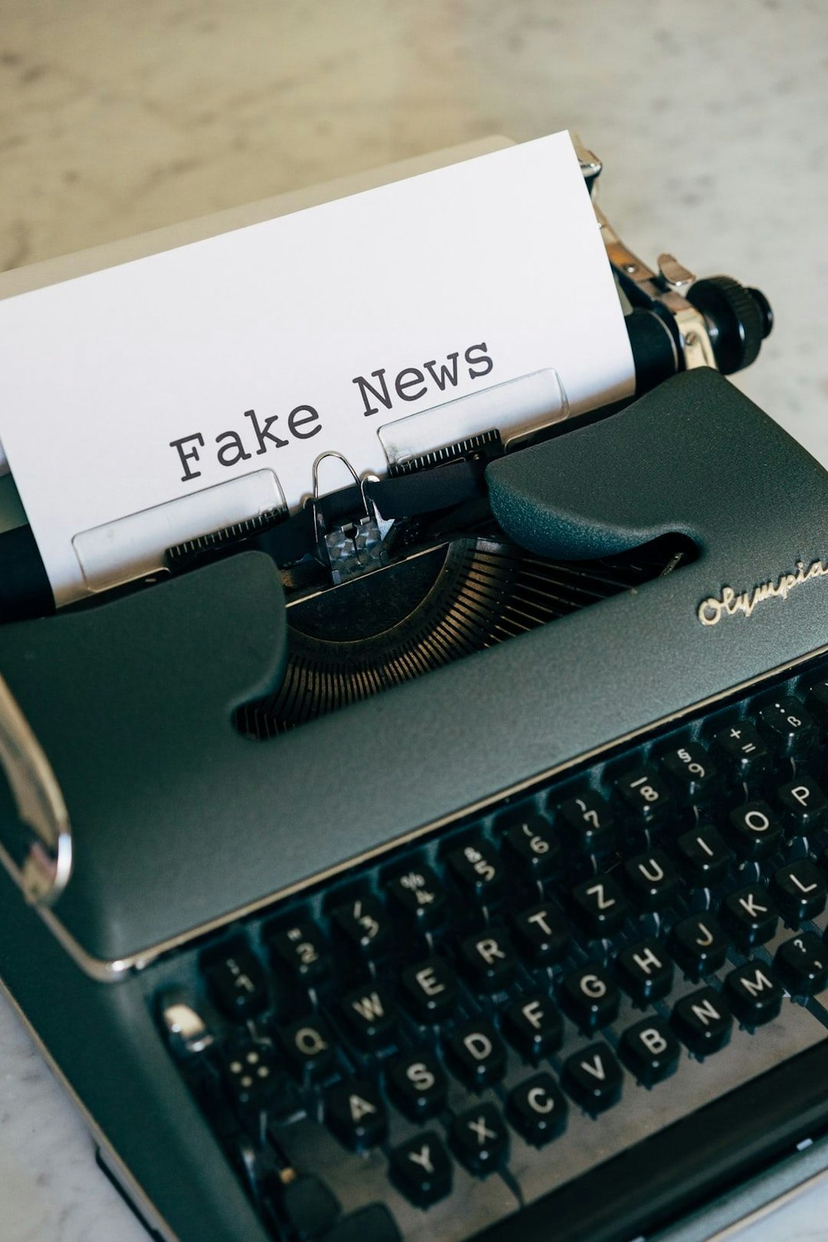 featured image - How to Combat Fake News