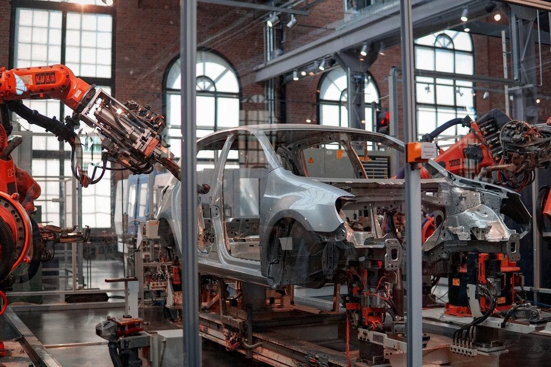 featured image - Smart Manufacturing: Why Lamborghini, Adidas & Amazon are Adopting It