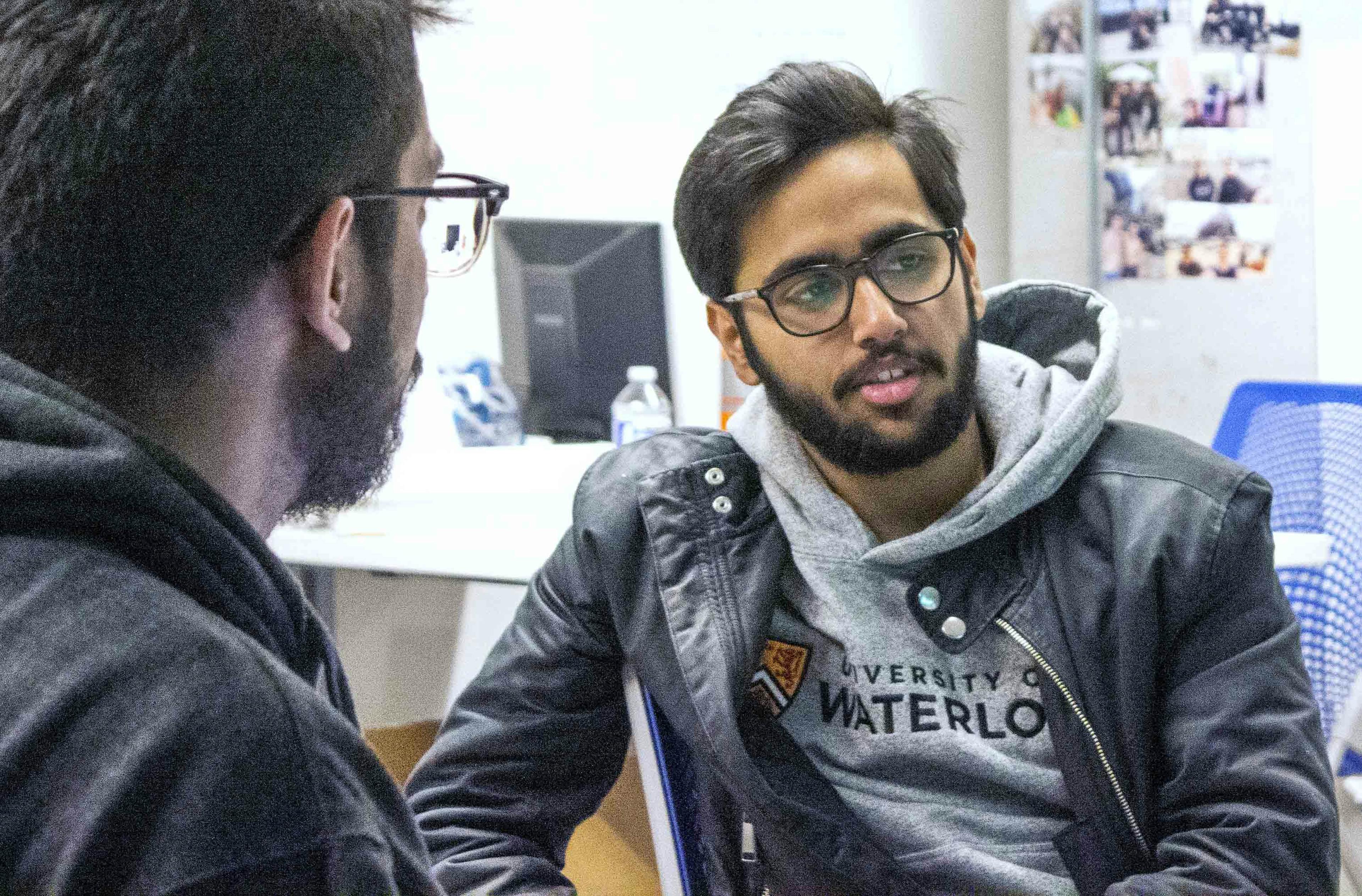 Omar Abbasi, CTO, (on the right), talking with Mahrus Kazi (past software engineering intern 2017-2019), for a Christmas party (2019).