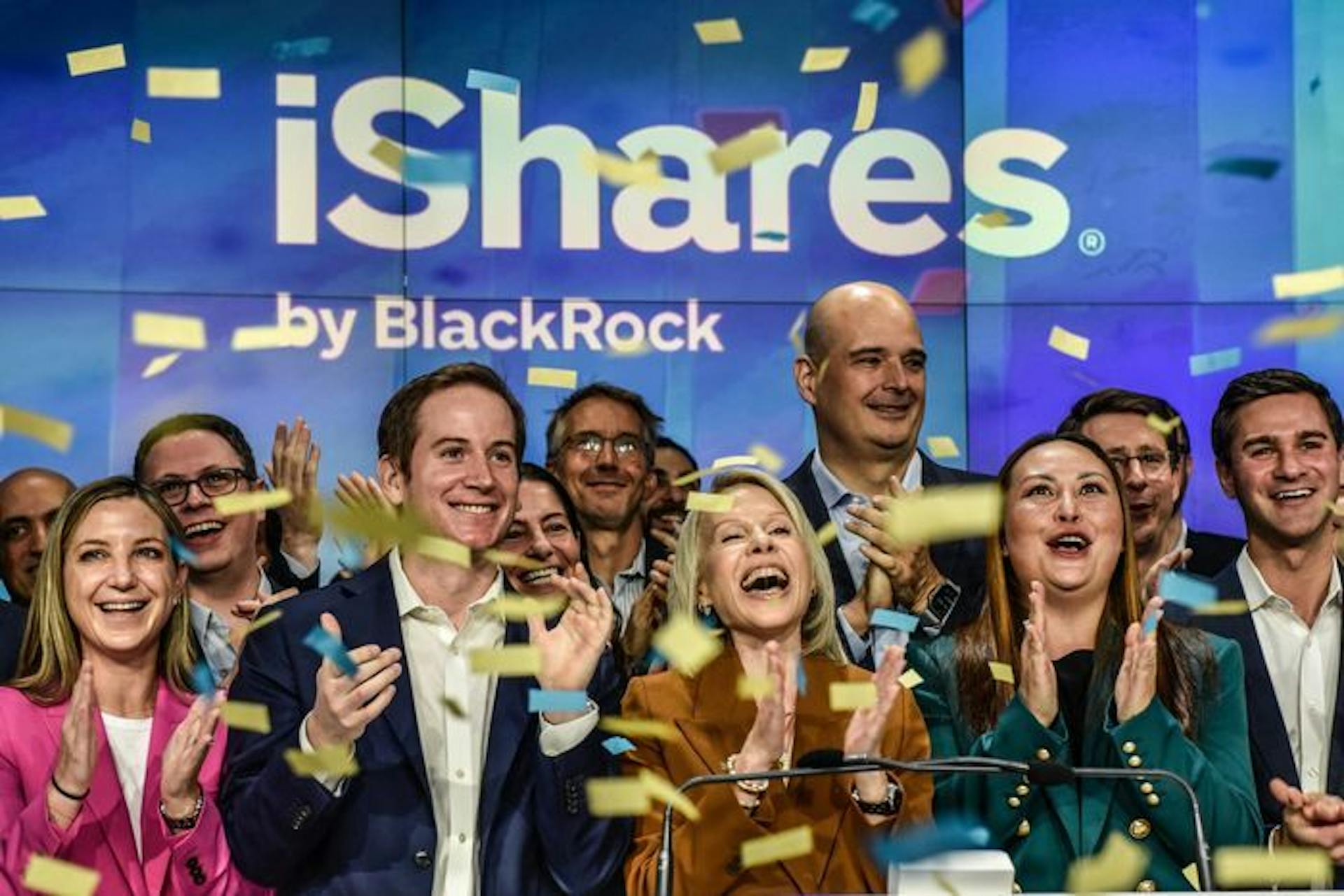 The Blackrock team rings Nasdaq's opening bell for the iShares Bitcoin Trust listing
