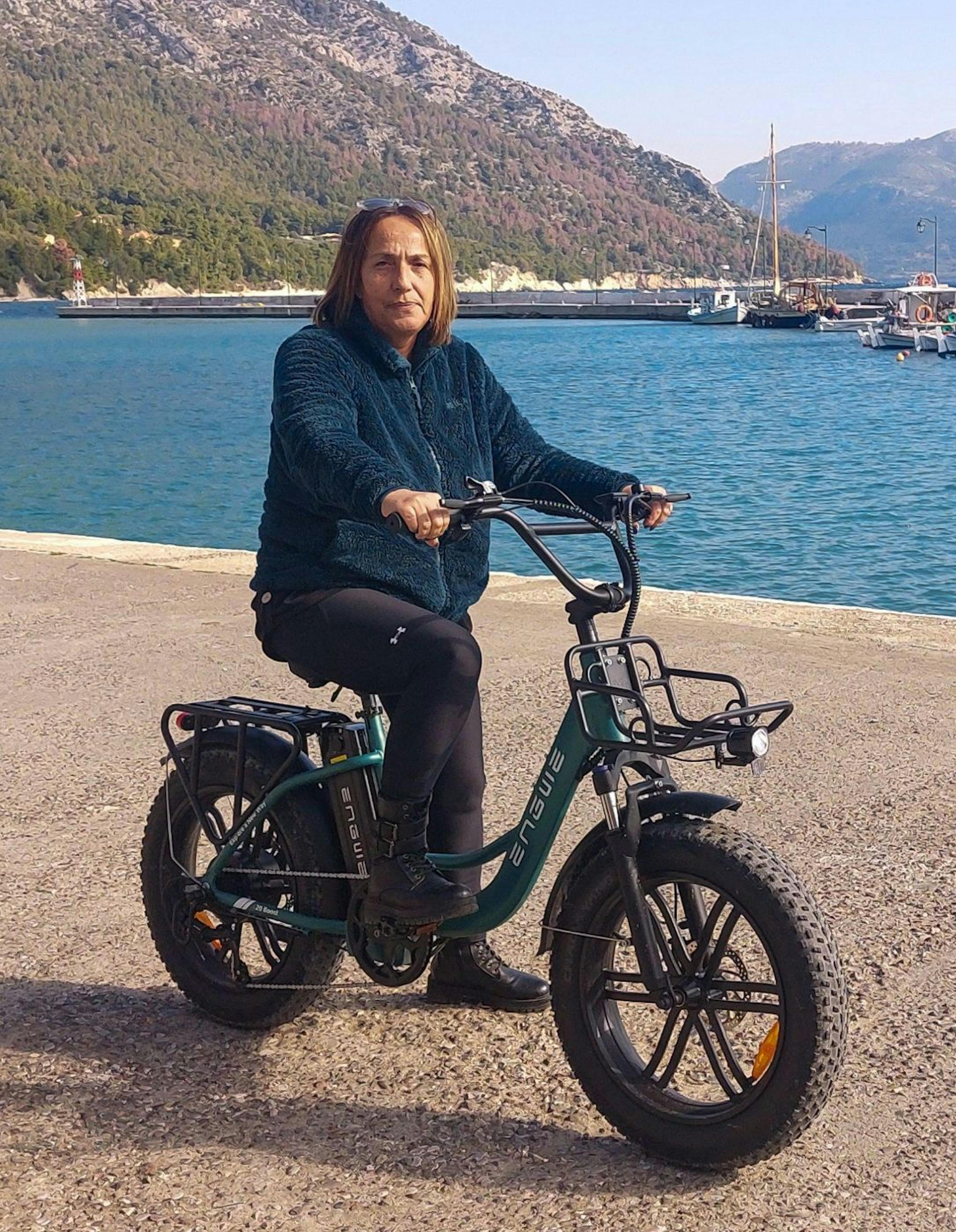 The chair of the Kalamos community, Yiota, at the island's main port.