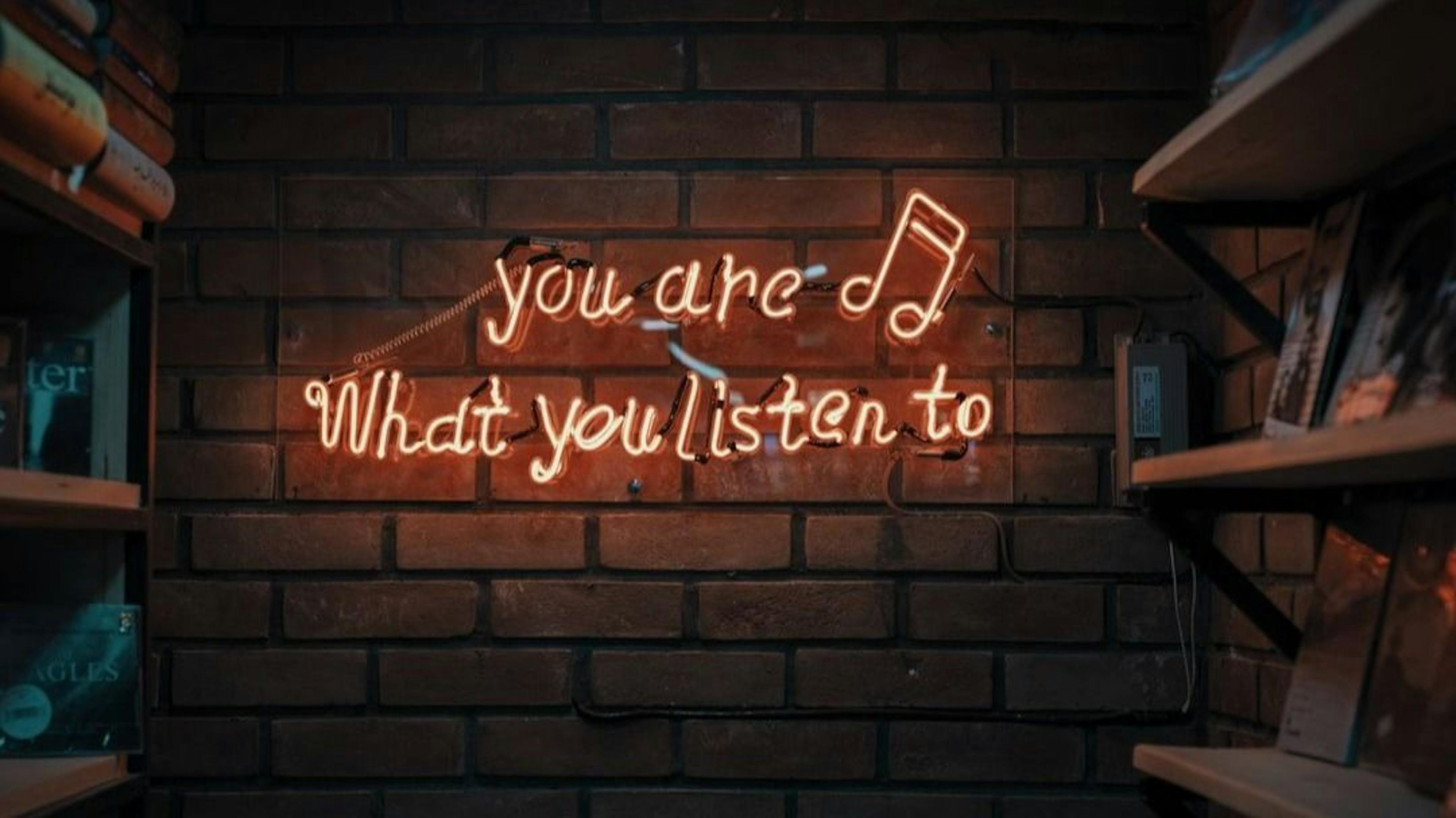 featured image - The Best Podcasts and Soundtracks to Listen to During Your Workday