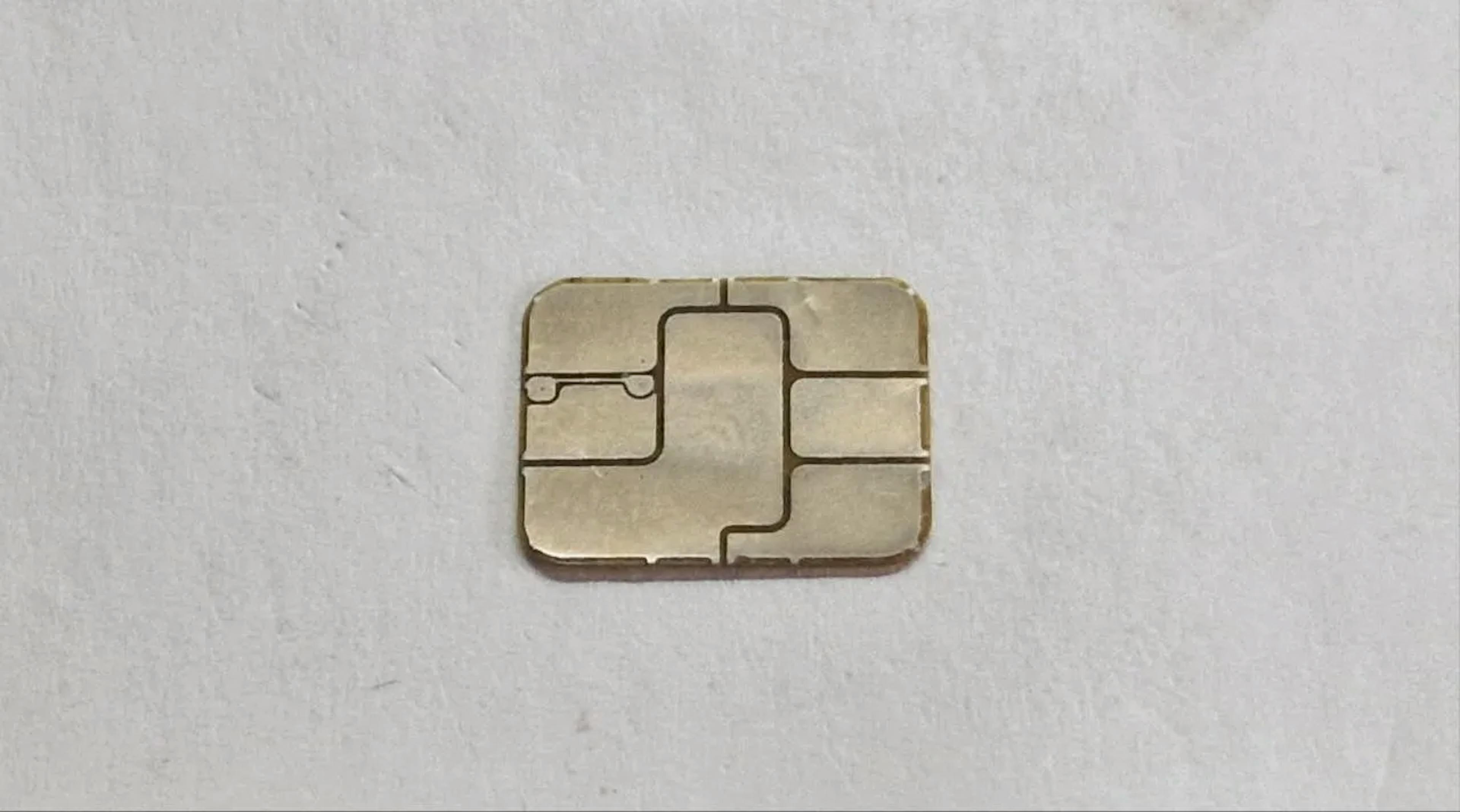 Payment card chip front