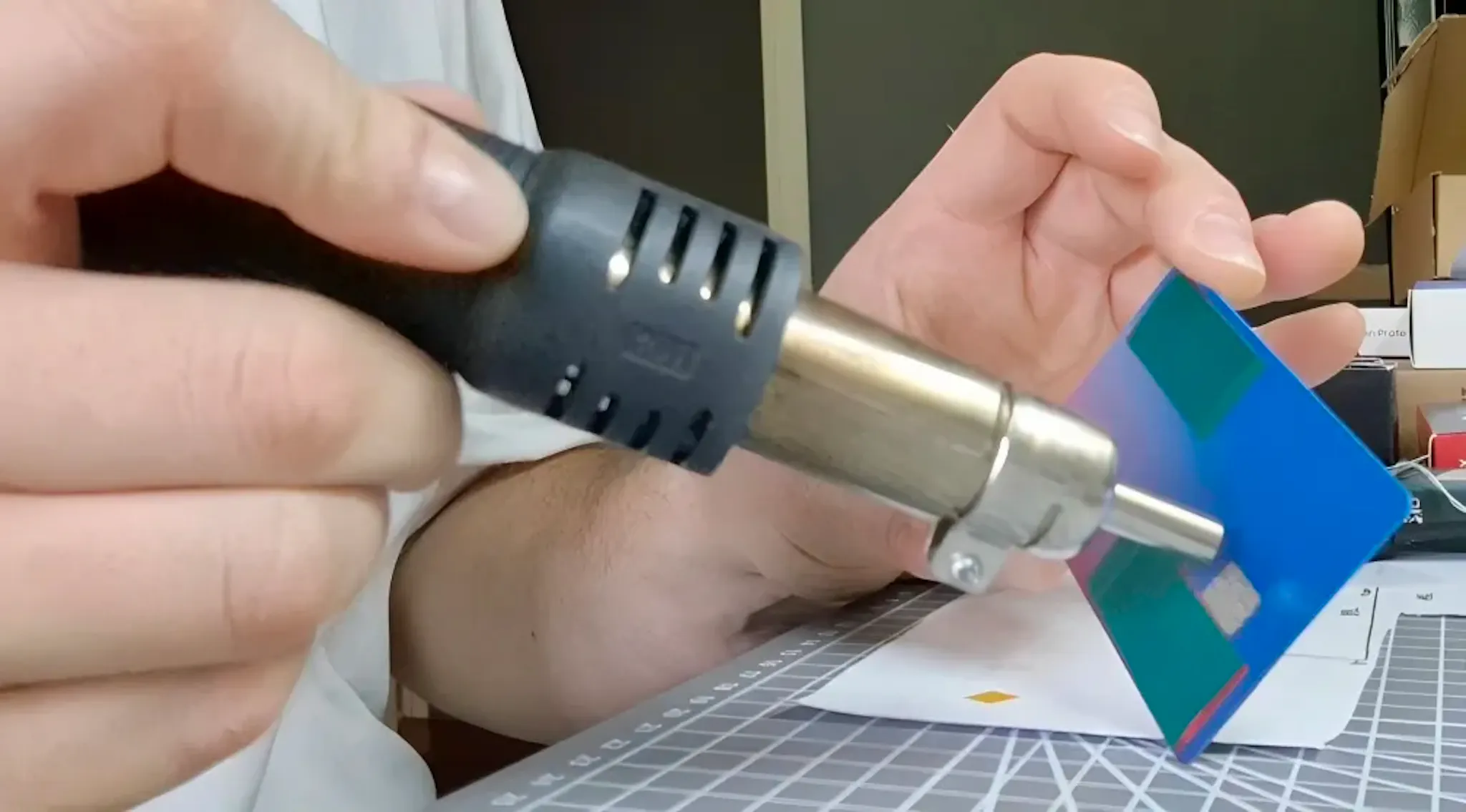 Heat gun banging the payment card chip front