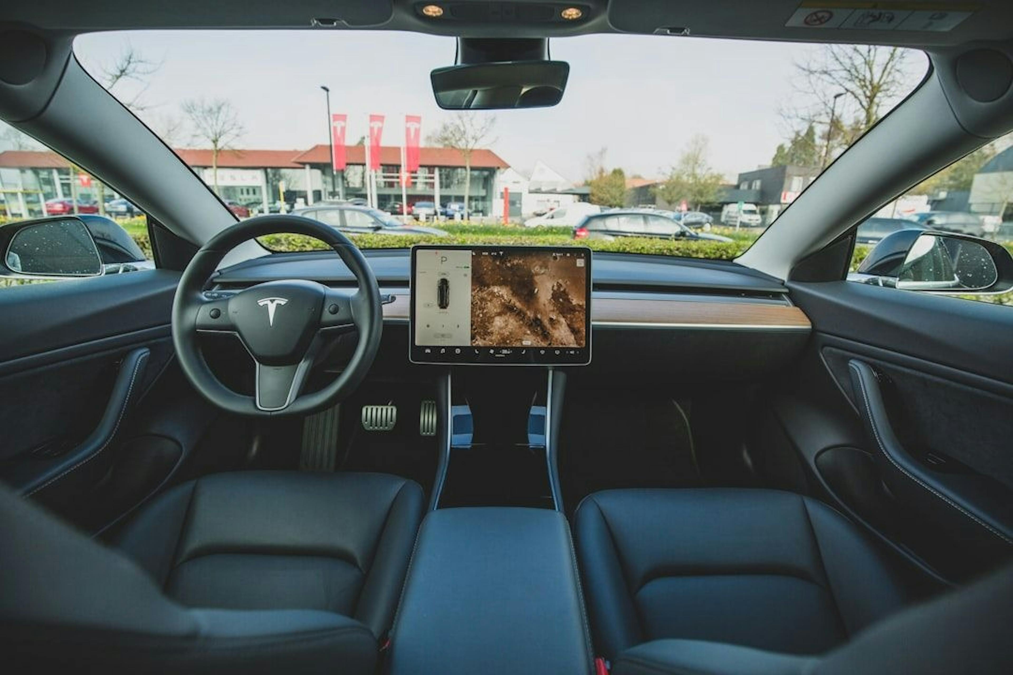 featured image - Is Tesla's Robotaxi a Bold Step or a Blunder? 