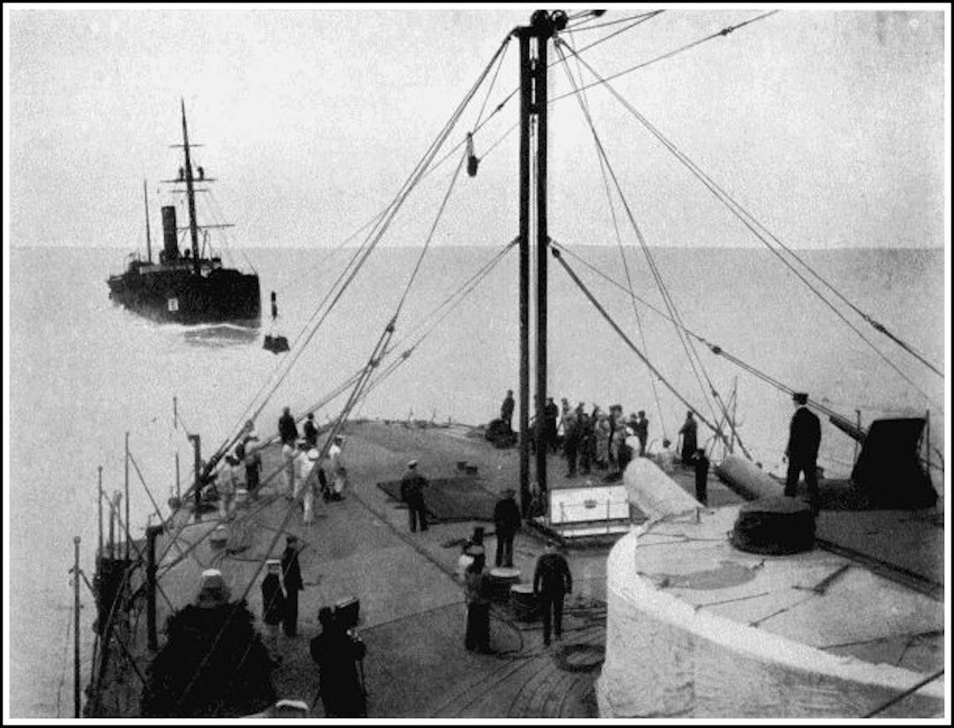 A TEMPERLEY-MILLER MARINE CABLEWAY COALING H.M.S. "TRAFALGAR" AT SEA