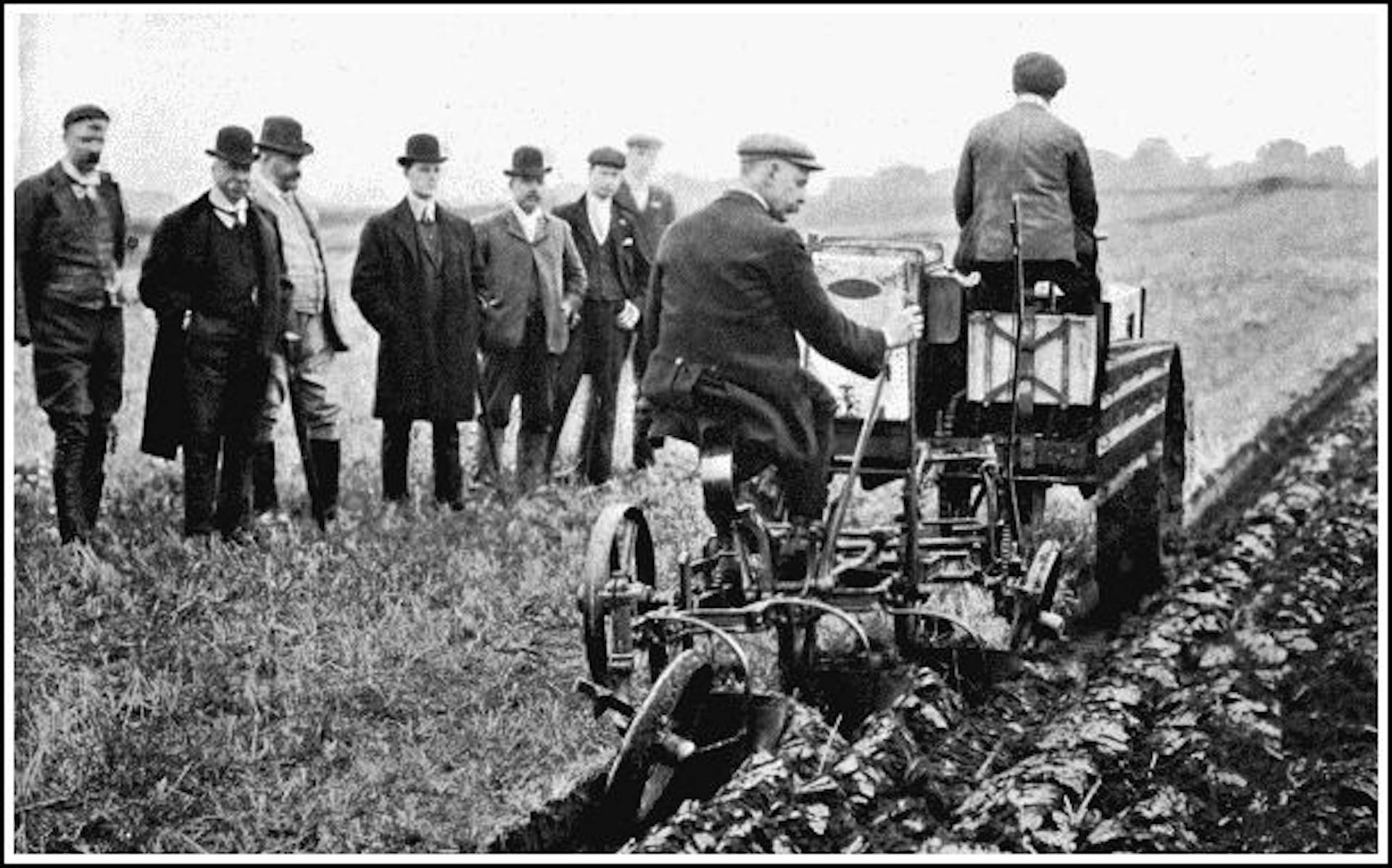 A MOTOR PLOUGH
The "Ivel" Agricultural Motor pulling a three-furrow plough. A motor thus harnessed will plough six acres a day at a total cost per acre of five shillings. It is also available for reaping, threshing, chaff-cutting, and other duties on a farm.